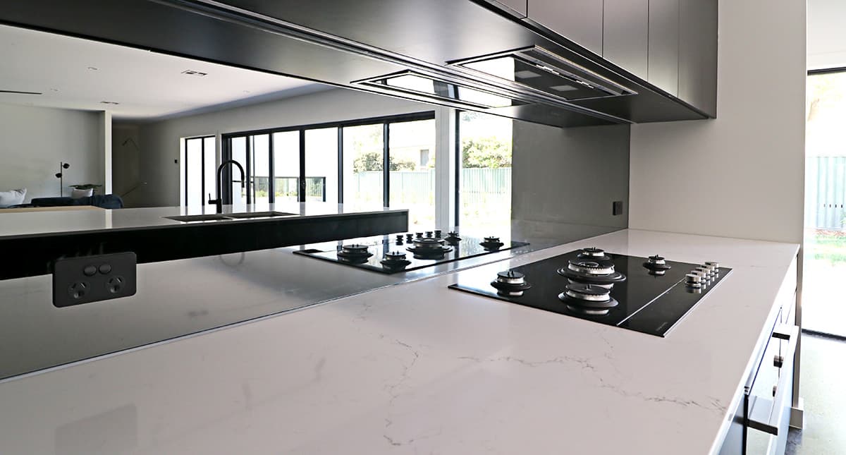 Architectural glass splashback in a contemporary kitchen